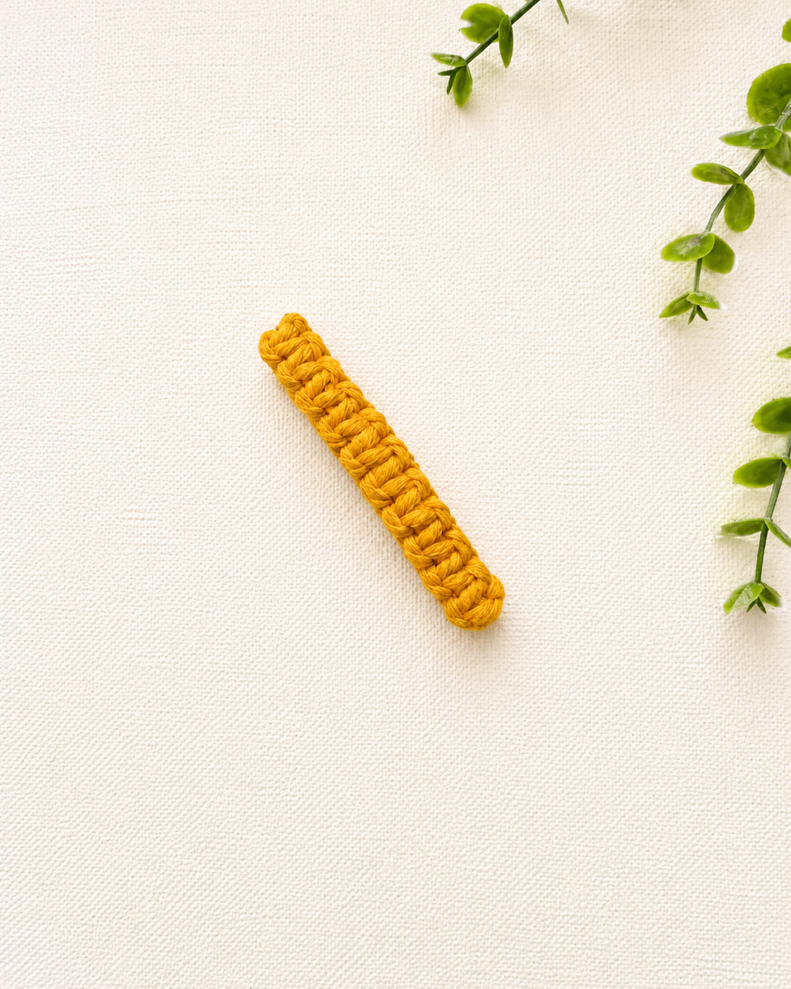 Mustard yellow handmade macramé hair clip made with soft cotton cord