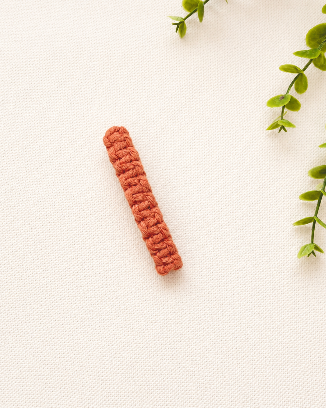 Terracotta handmade macramé hair clip crafted from soft cotton cord