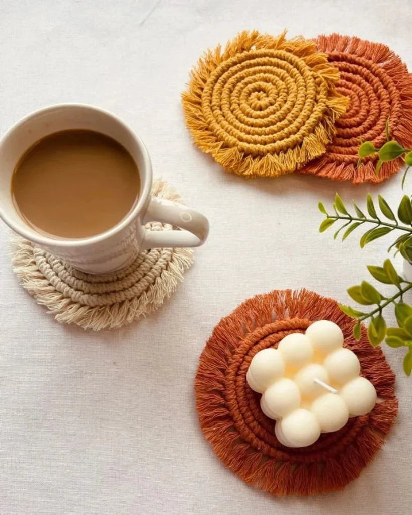 Boho macramé coasters set with coffee mug and candle – handmade table décor