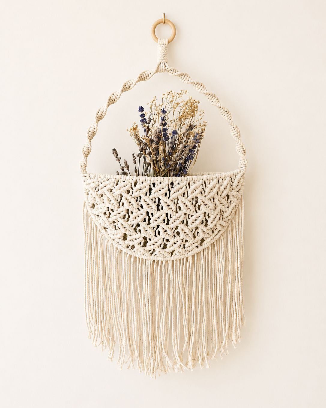 Handmade double-sided macrame wall pocket with dried lavender flowers, handcrafted from Egyptian cotton cord.
