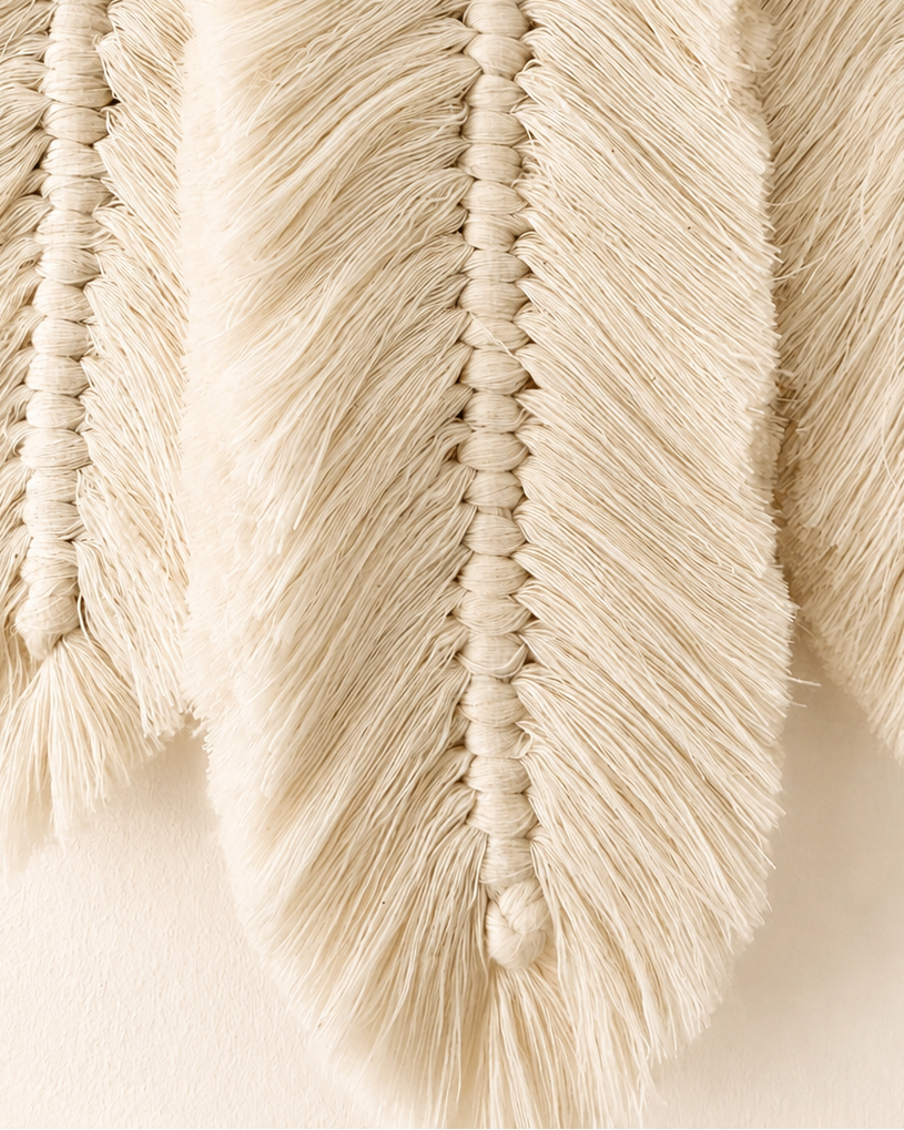 Close-up of soft hand-knotted Egyptian cotton macrame feather texture