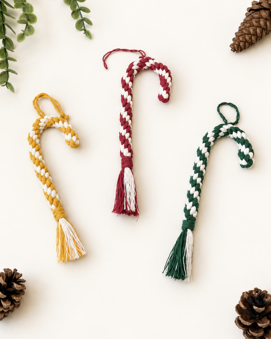 Handmade macrame candy cane Christmas ornaments in burgundy, mustard and green with cream