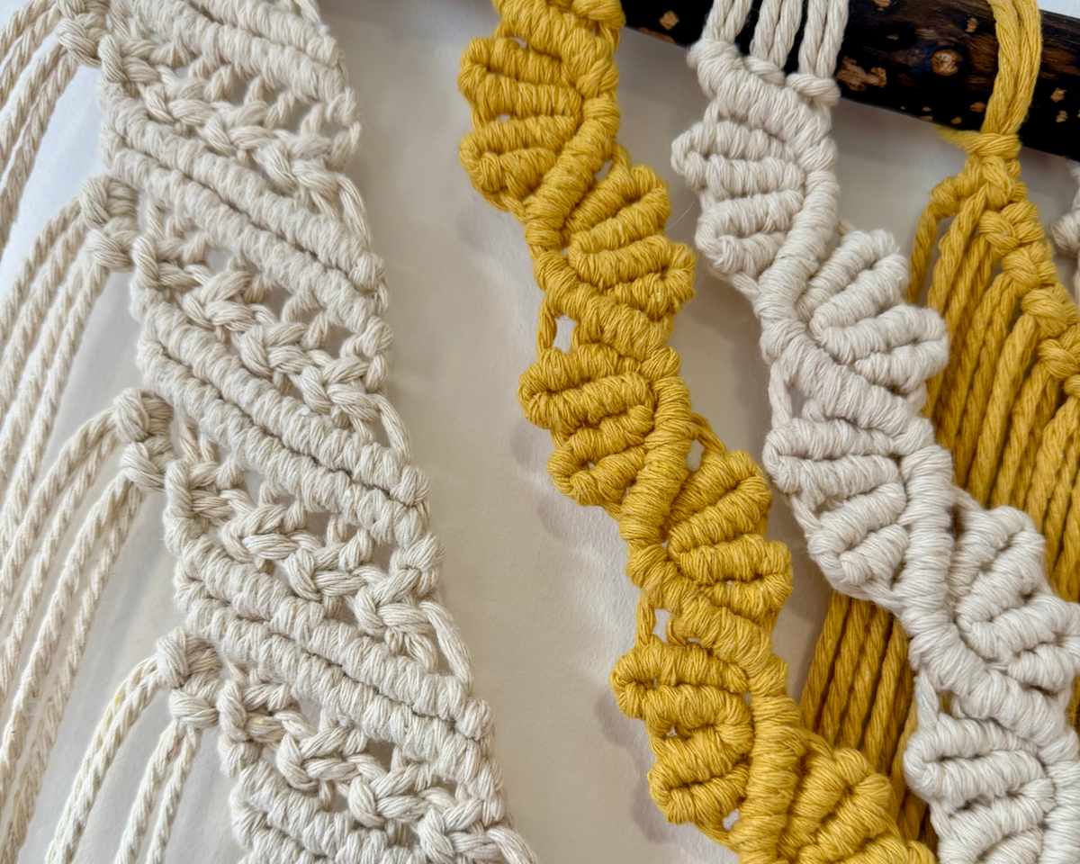 Close-up of carefully hand-knotted Samra Knots macrame showing neat mustard and natural cotton knotwork.