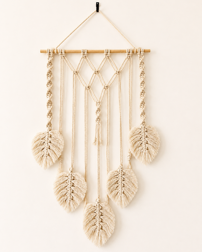 Handmade off-white macrame photo holder wall hanging with five cotton leaves