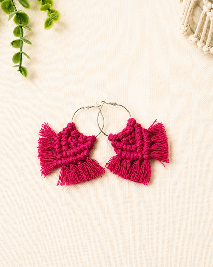 Handmade hot pink macrame chevron hoop earrings with silver hoops and cotton fringe.