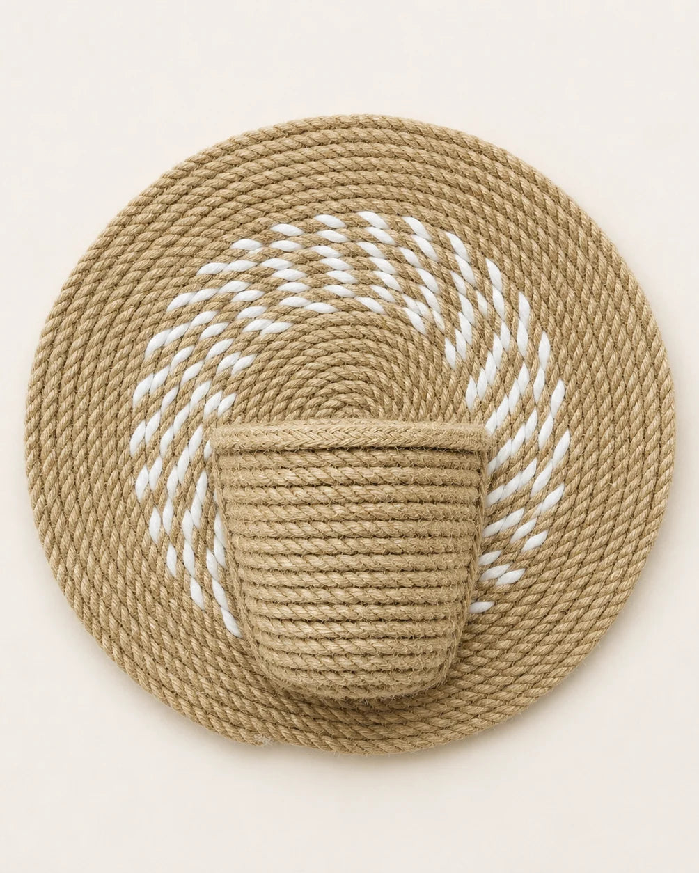 Handmade natural jute wall plant holder with off-white spiral detail