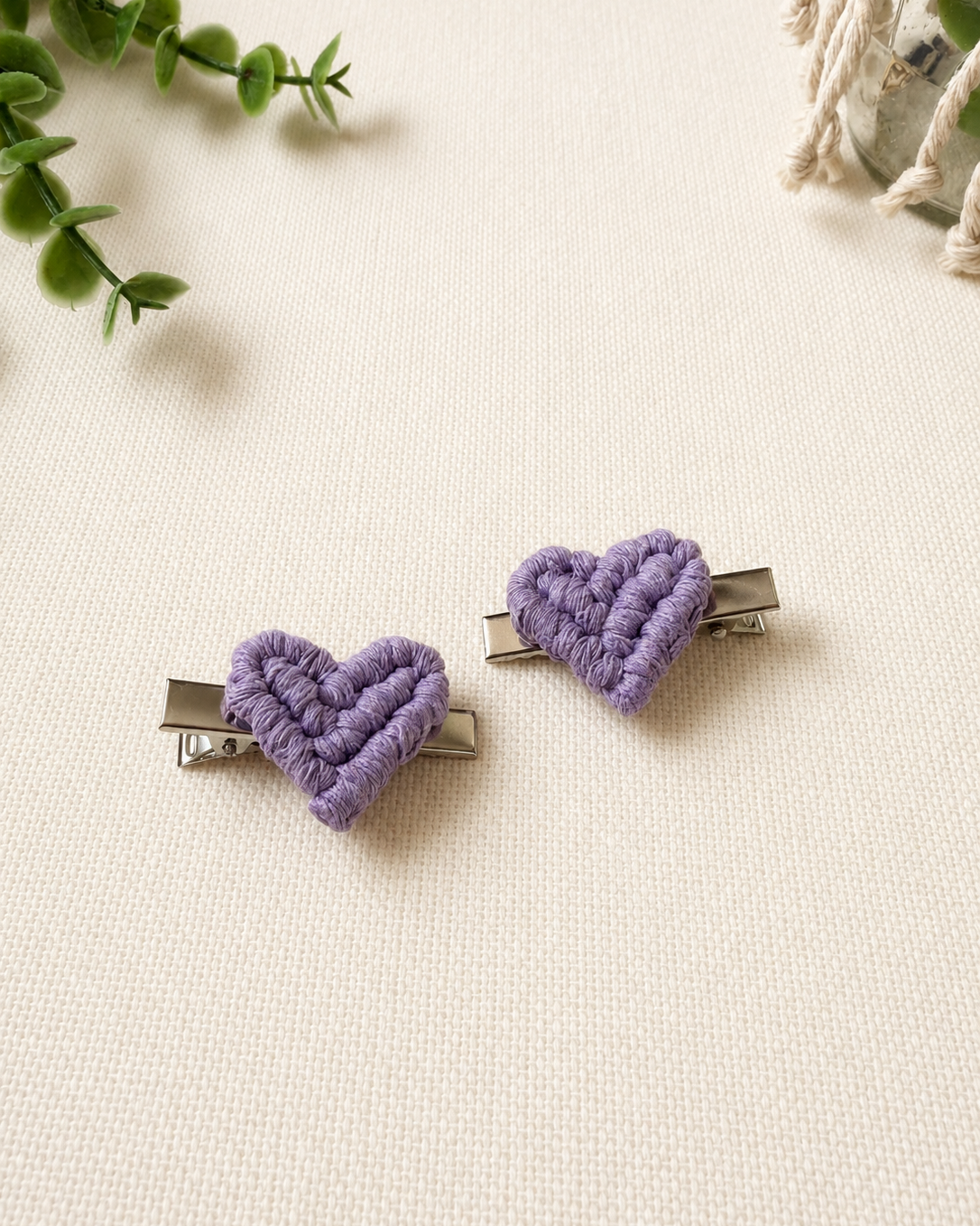 Set of two lilac handmade macrame heart hair clips.