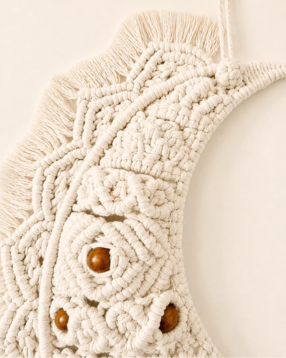 Close-up of detailed knots on handmade Egyptian cotton macrame crescent moon wall hanging