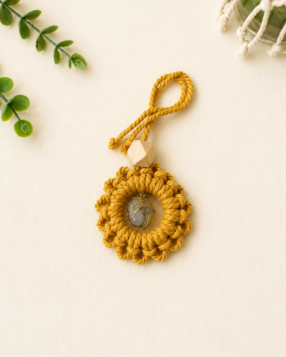 Handmade mustard macrame gemstone car charm with a natural unfinished wooden essential oil diffuser bead.
