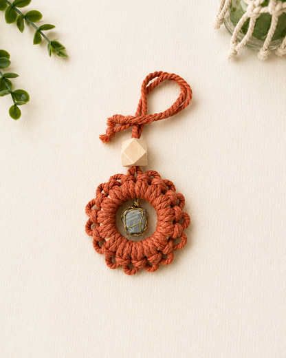 Handmade terracotta macrame gemstone car charm with a natural unfinished wooden essential oil diffuser bead.