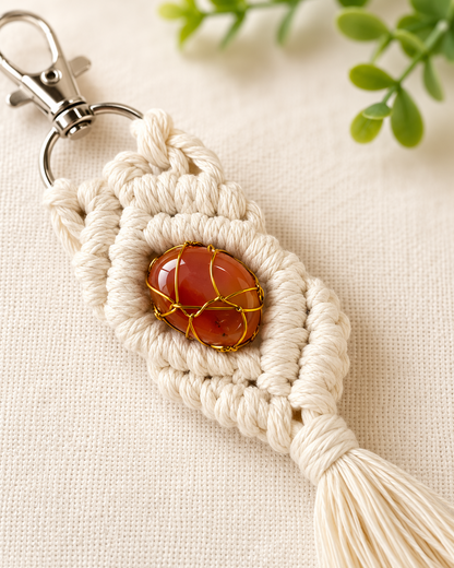 Close-up of a handmade macrame gemstone keychain showing the natural gemstone, cotton knots and handcrafted details.