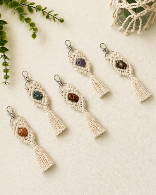Handmade macrame gemstone keychains in five natural gemstone styles with cotton tassels and silver clasps.