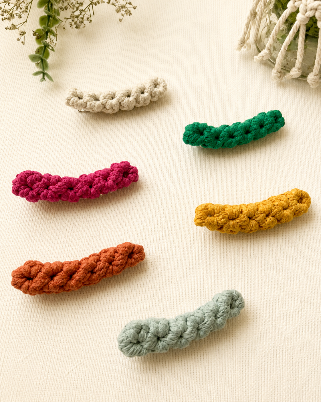 Collection of colourful handmade macrame hair clips.