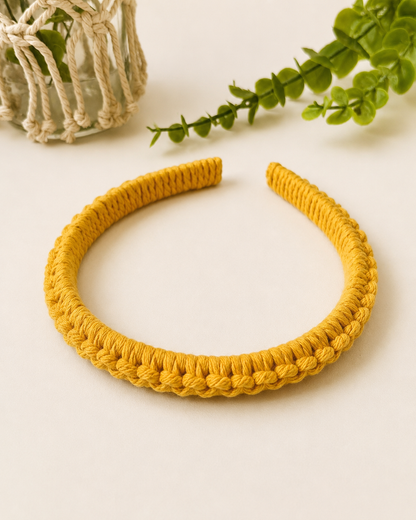 Mustard yellow handmade macramé headband made from cotton cord.