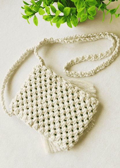 Back view of woven macramé phone bag in off-white cotton – boho textured pattern
