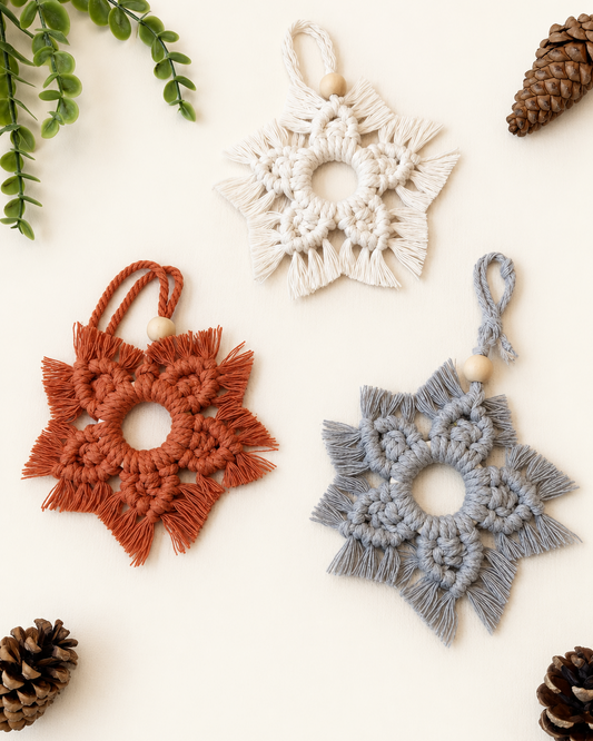 Handmade macrame snowflake Christmas ornaments in off white, grey and terracotta