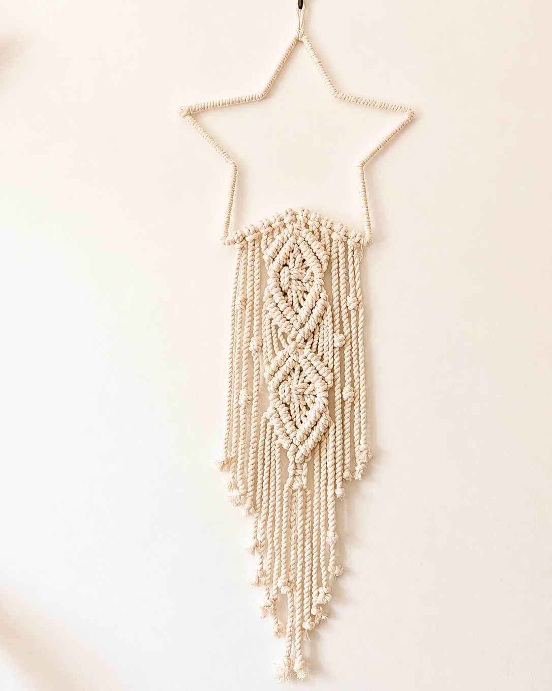 Handmade Diamond macrame star wall hanging in natural off-white cotton