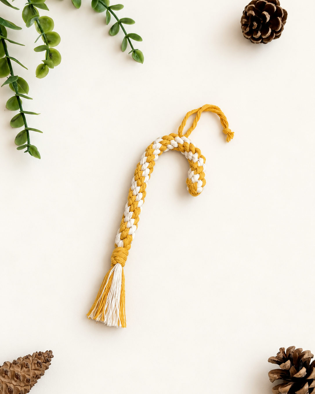 Handmade mustard and cream macrame candy cane Christmas ornament