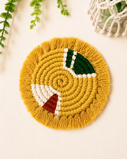 Mustard geometric cotton macramé coaster with fringe, handmade boho coffee coaster for table decor.