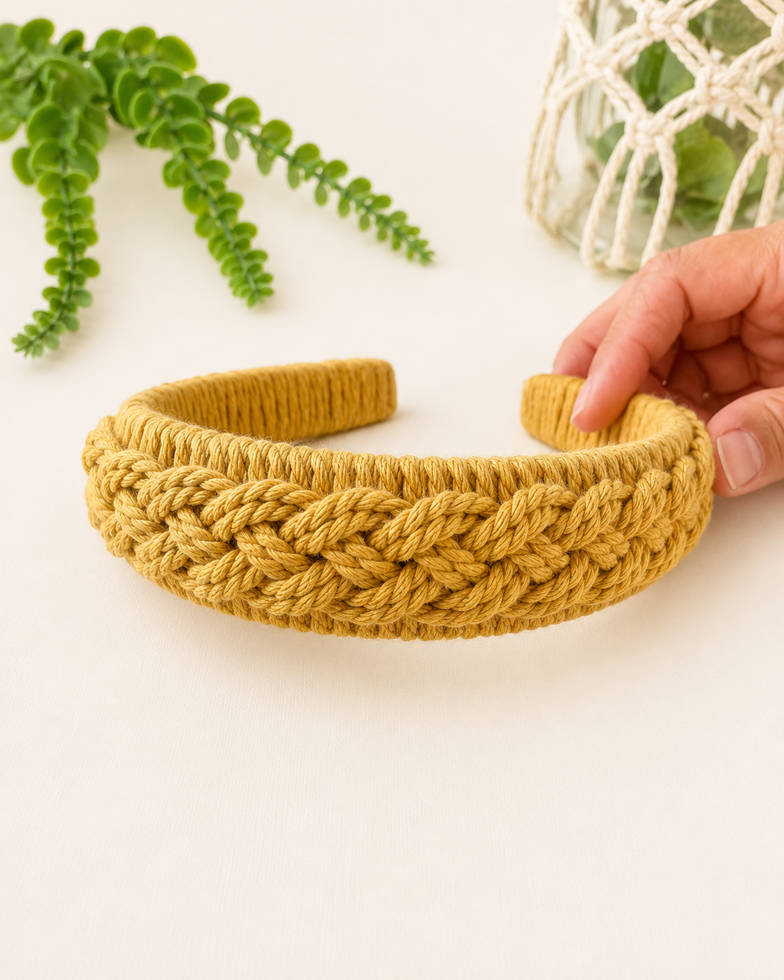 Handmade mustard macrame headband with textured braided knot design