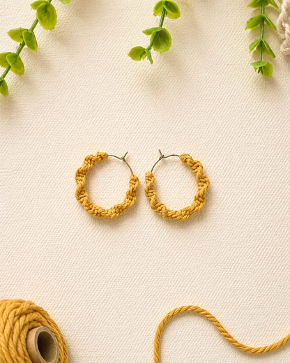 Mustard yellow handmade macramé spiral hoop earrings wrapped in cotton cord.