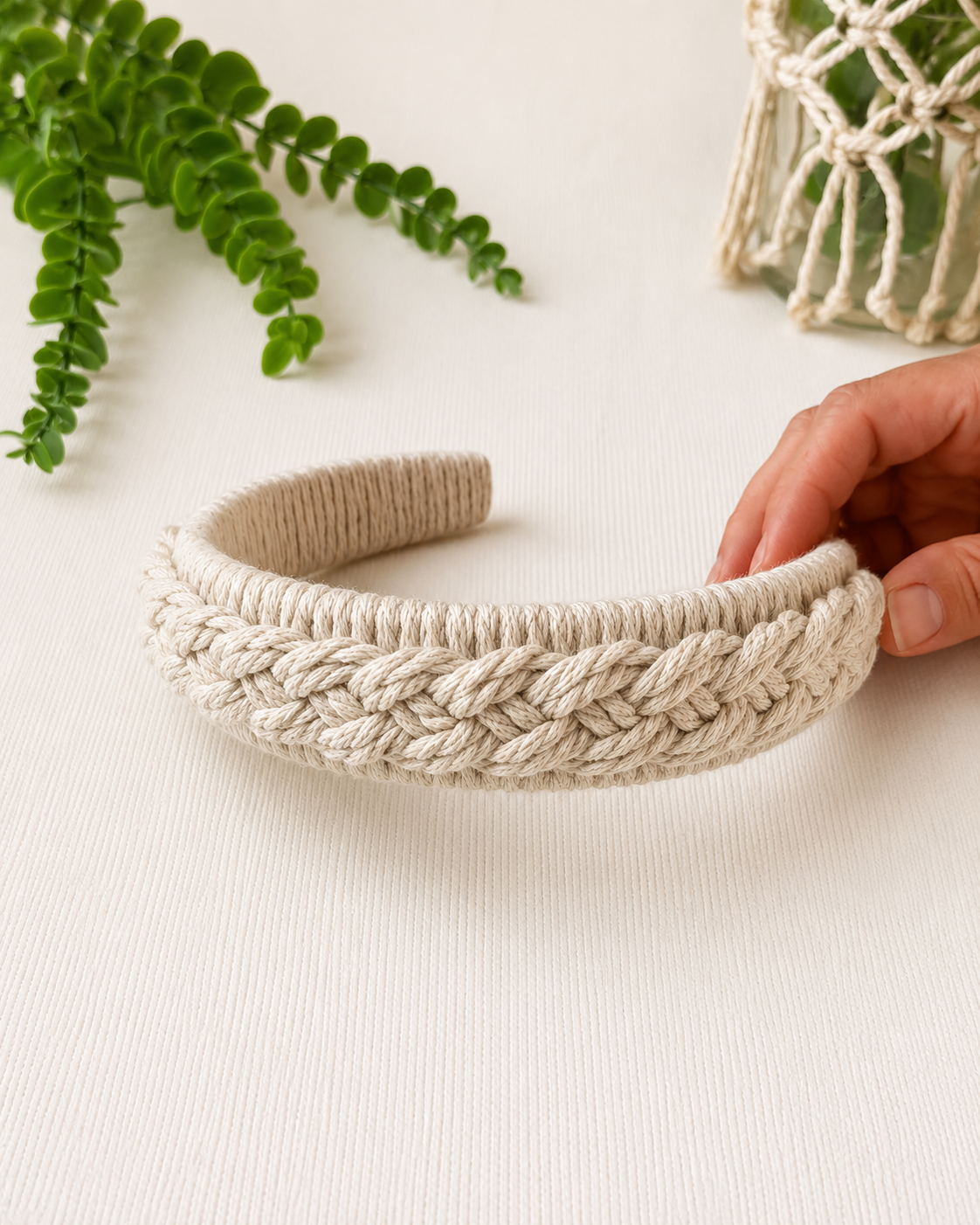 Handmade off-white macrame headband with textured braided knot design