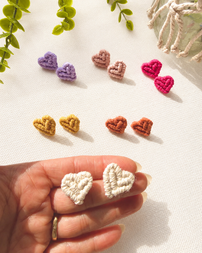 Handmade macramé heart earrings shown with colour options and jewellery display cards.