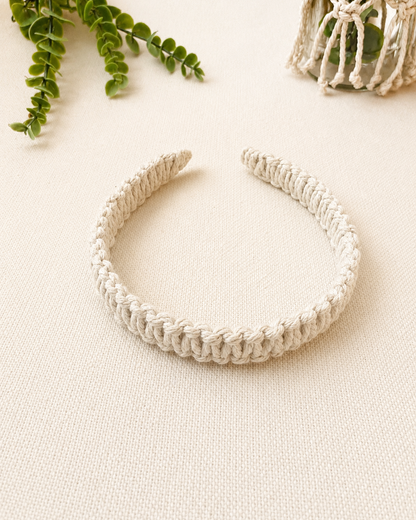 Handmade off white macrame square knot headband crafted from cotton cord.