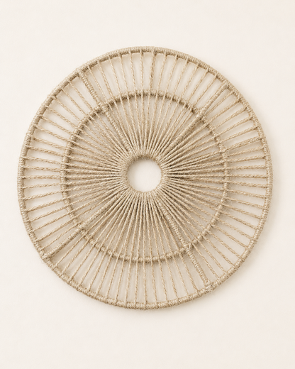Handmade open round jute wall decor with woven radial design