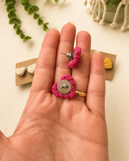 Back view of handmade pink macrame heart stud earrings with stainless steel posts.