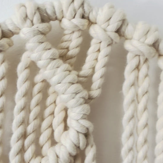 Video showing the handmade Zigzag macrame star wall hanging and knot details