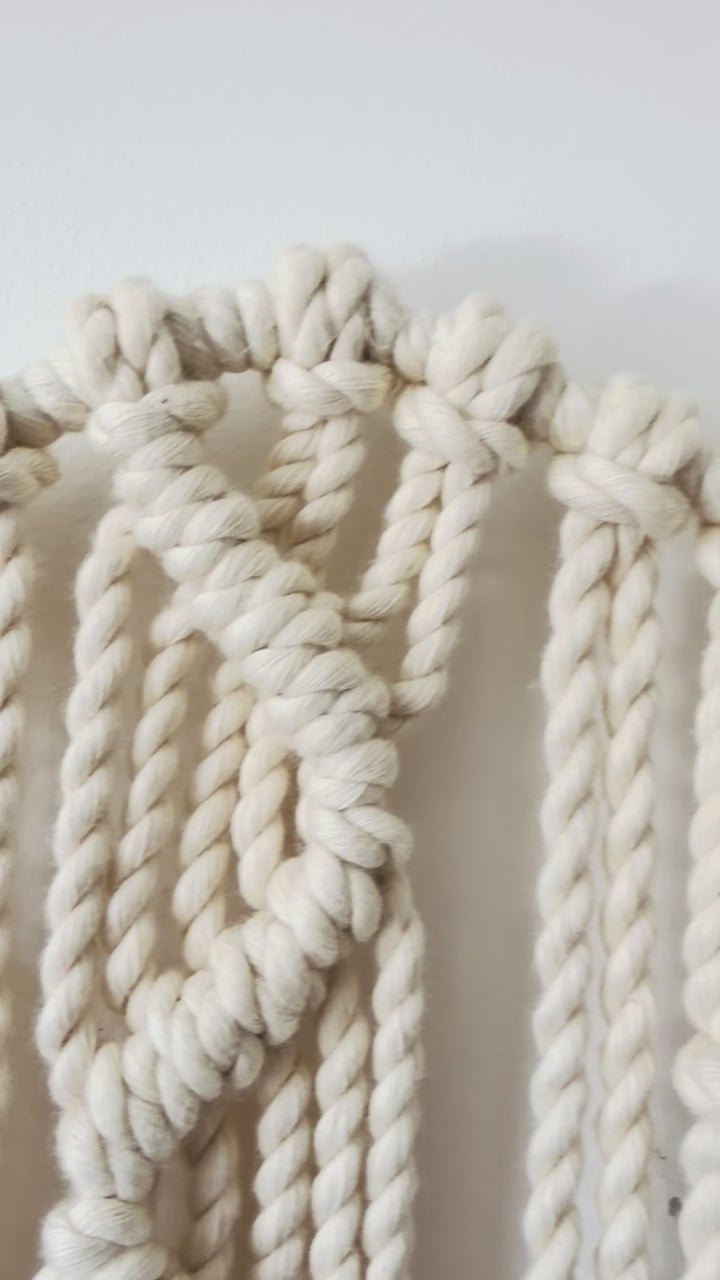 Video showing the handmade Zigzag macrame star wall hanging and knot details