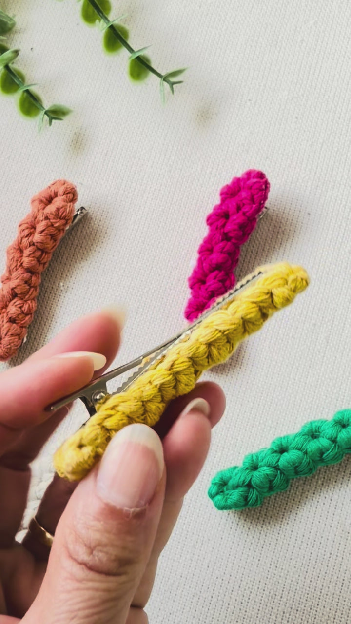 Demonstration of the secure French barrette clip on the handmade macrame hair clip.