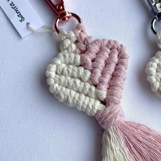 Showcase of handmade macrame heart keyrings in multiple colours with tassels, cotton bag charms and thoughtful handmade gifts.
