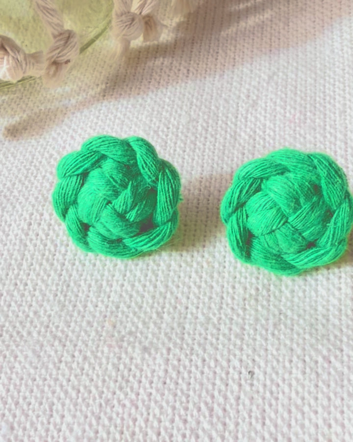 Video showing handmade macramé flower stud earrings available in multiple colours.