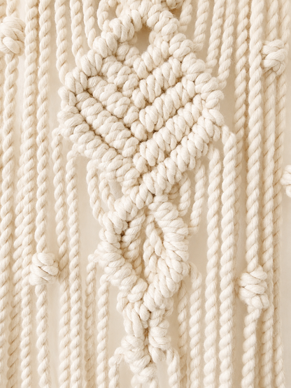 Close-up video showing Egyptian cotton knots on handmade crescent moon wall hanging