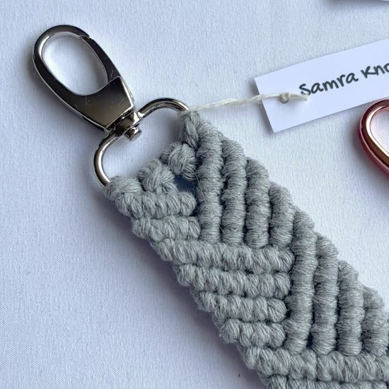 Showcase of handmade macrame mermaid keyrings in multiple colours with tassels, cotton bag charms and thoughtful handmade gifts.