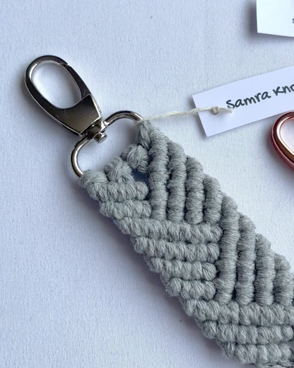 Showcase of handmade macrame mermaid keyrings in multiple colours with tassels, cotton bag charms and thoughtful handmade gifts.