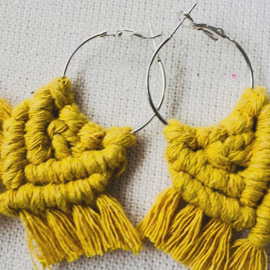 Video showing handmade macrame chevron hoop earrings with close-up details and movement.