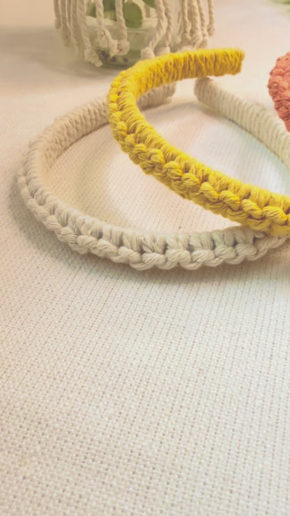 Video showing handmade cotton macramé headband from different angles.